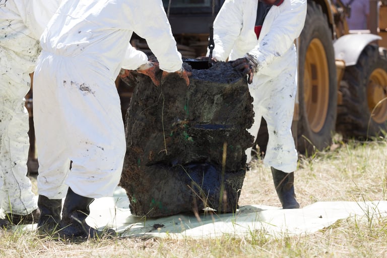 Professional sewage cleanup crew in protective PPE equipment